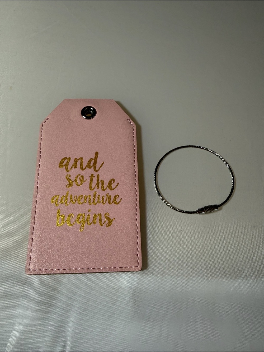 Casmonal 'And so Adventure begins' faux leather luggage tag pink